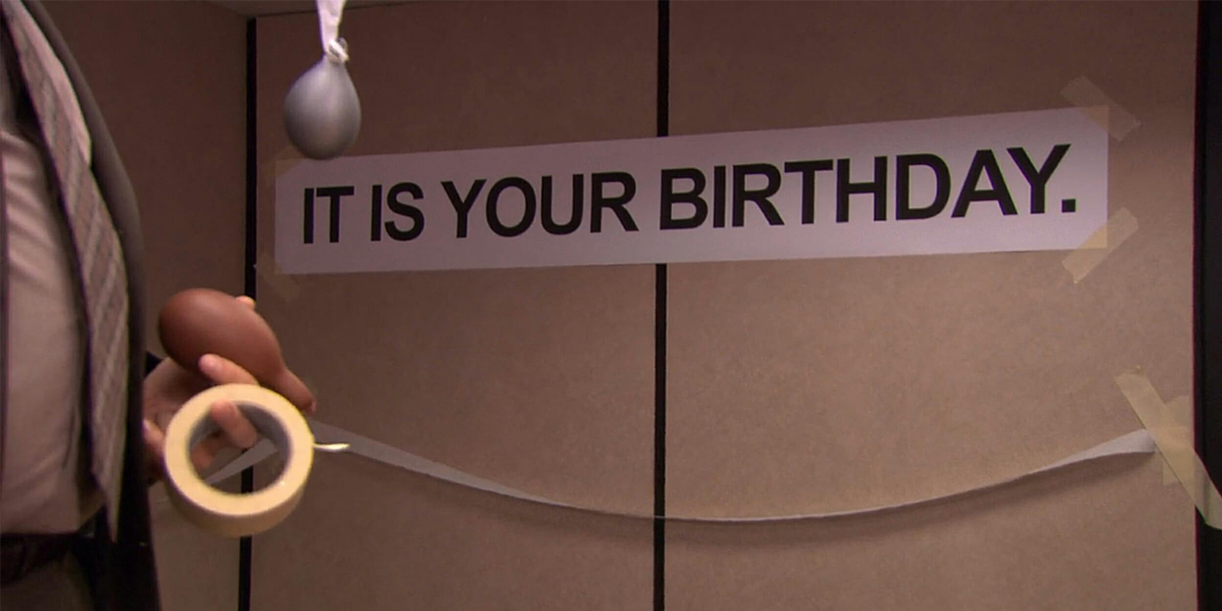 Dwight from "The Office" puts up "It is your birthday." sign in break room