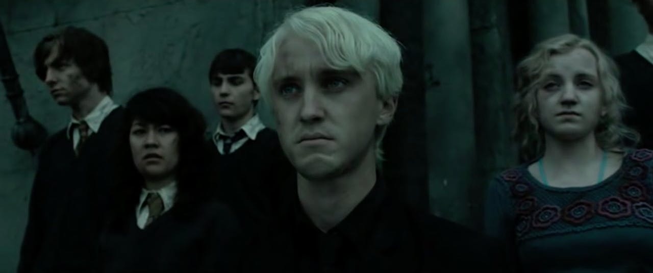 Draco malfoy and his girlfriends looking sad on Craiyon