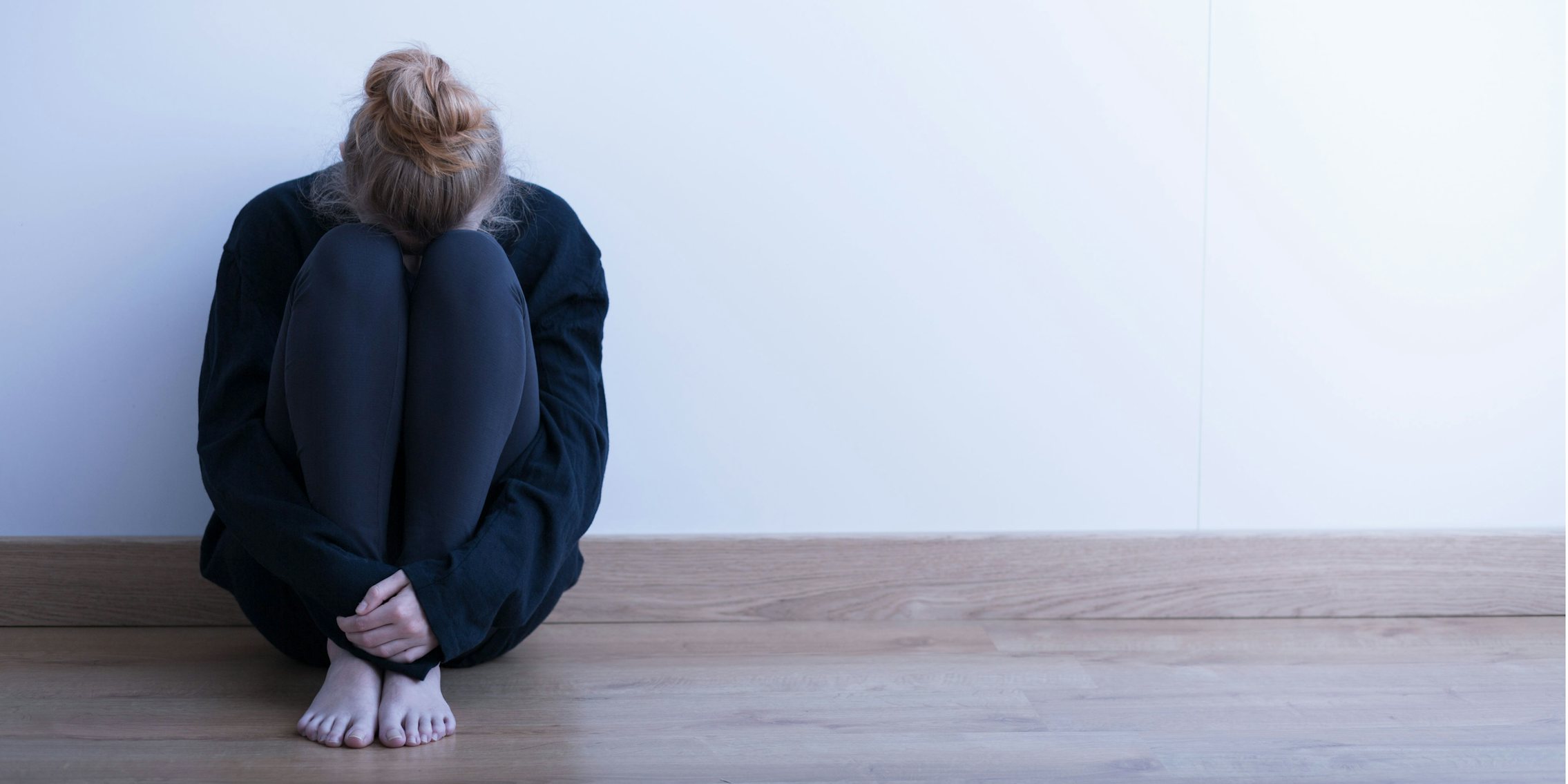 woman alone anxiety depressed