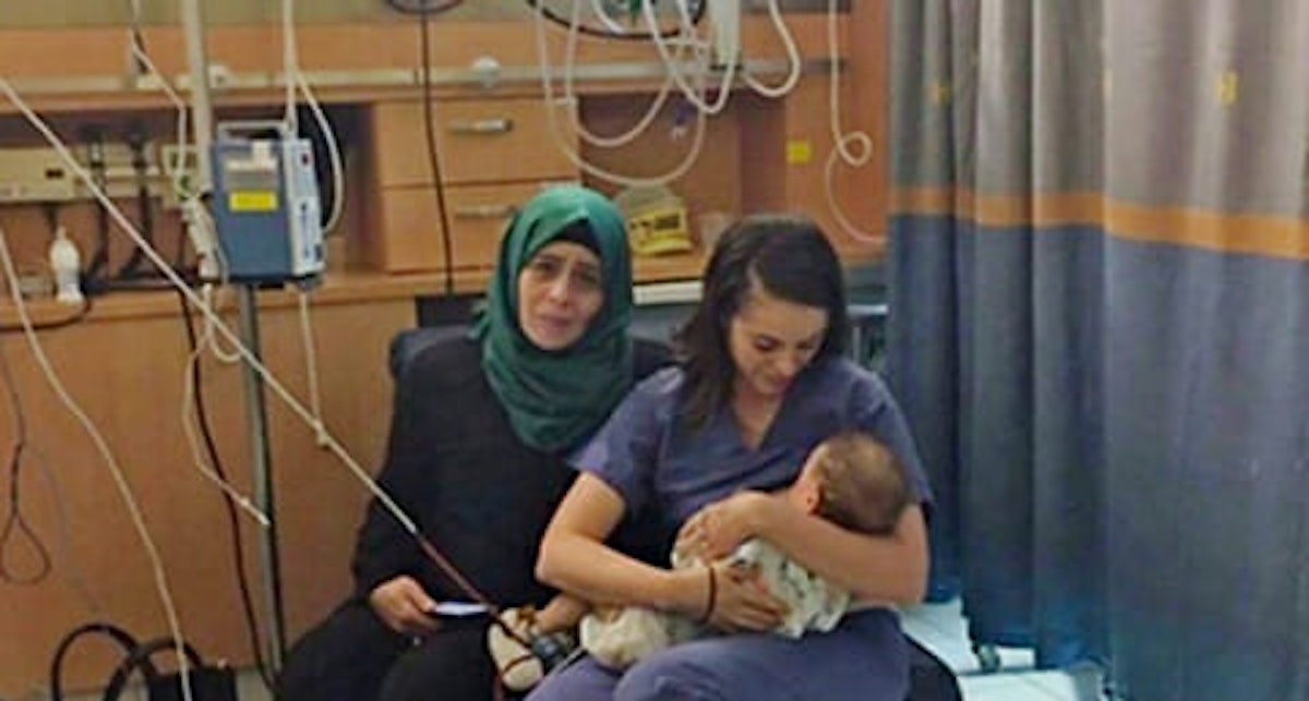Israeli nurse breastfeeding