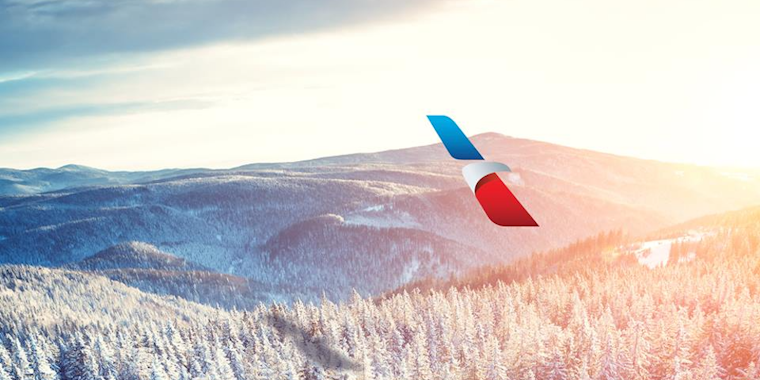 American Airlines logo over snowy winter scene