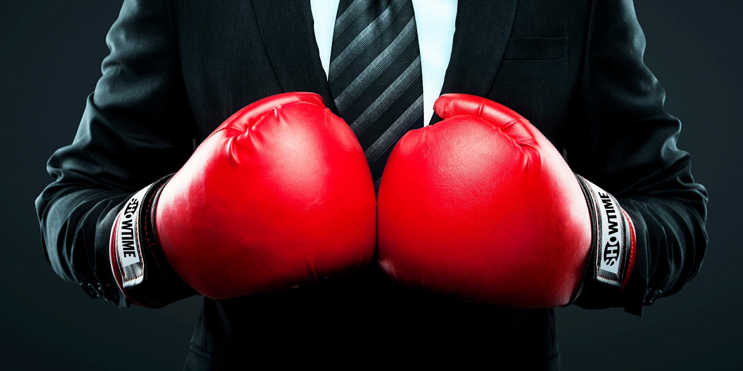 businessman in boxing gloves