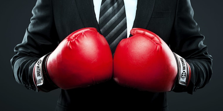 businessman in boxing gloves