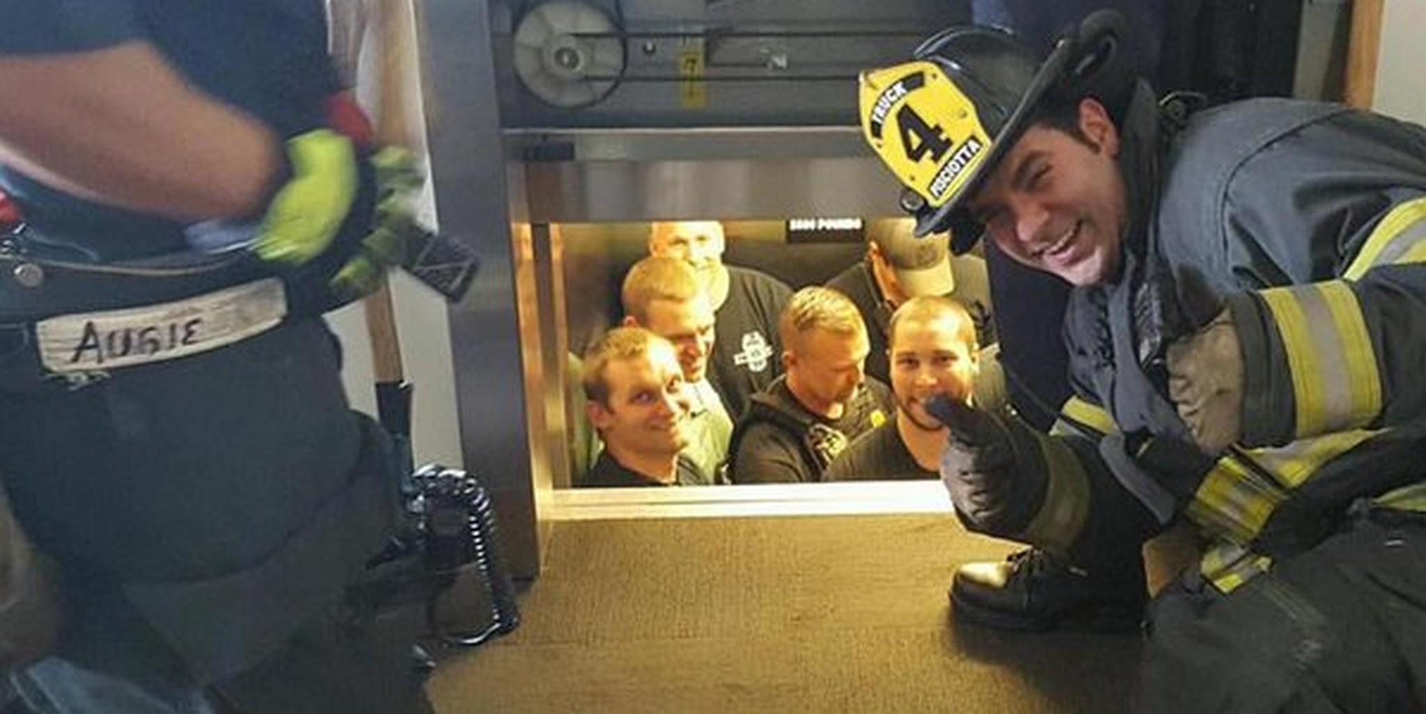 Embarrassed Police Saved From Stuck Elevator By Rival Firefighters ...