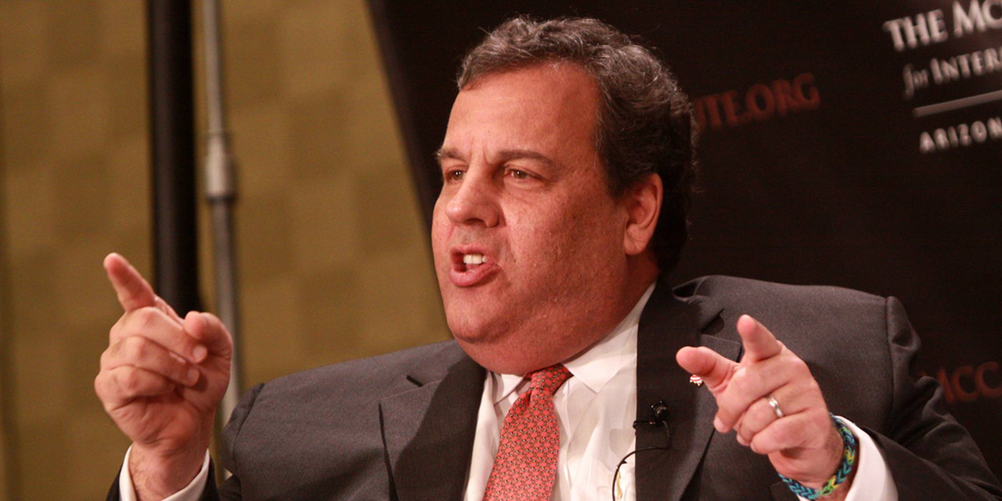 Chris Christie pouring bag of M&Ms into box of M&Ms reveals perplexing