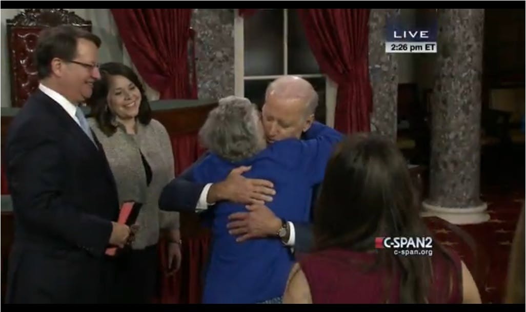 Vice President Biden hugs Sen. Gary Peters (D-Mich.)'s mother