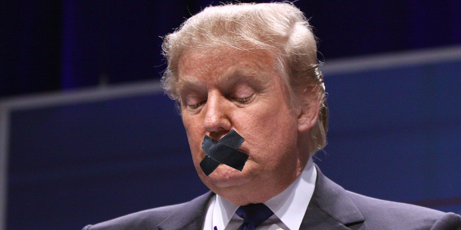 Donald Trump with tape over his mouth