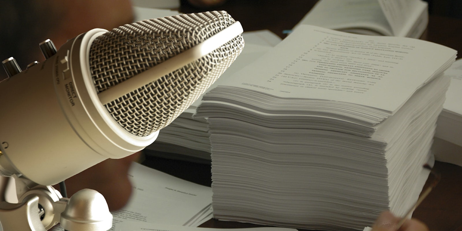 Microphone and stack of papers
