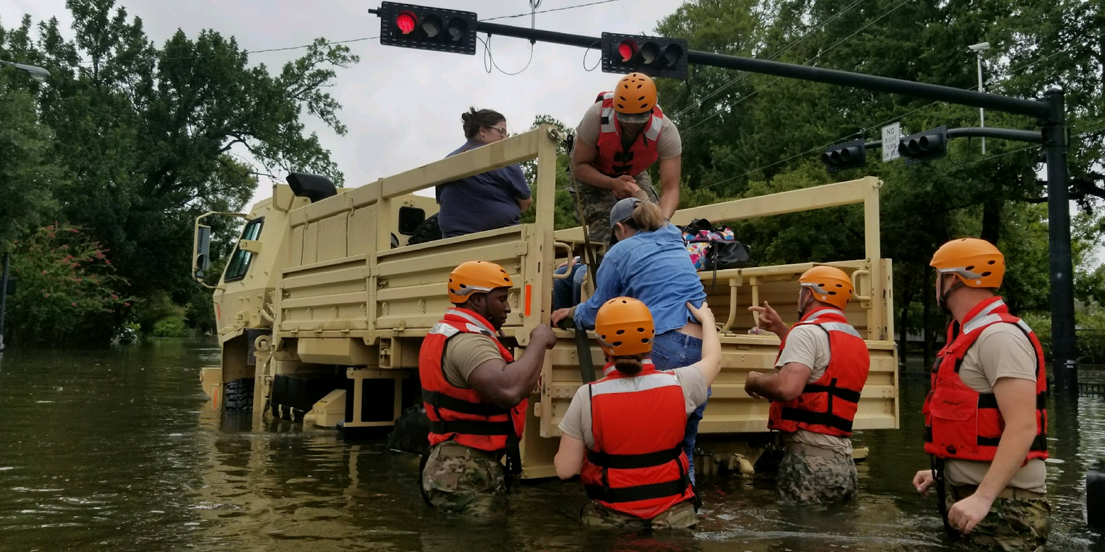 Texas National Guard soldiers conduct rescue operations in flooded areas around Houston.