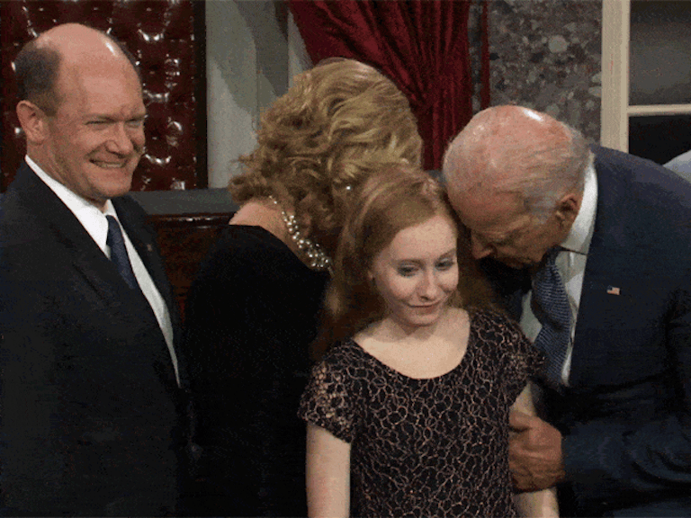 Biden Coons Daughter Kiss