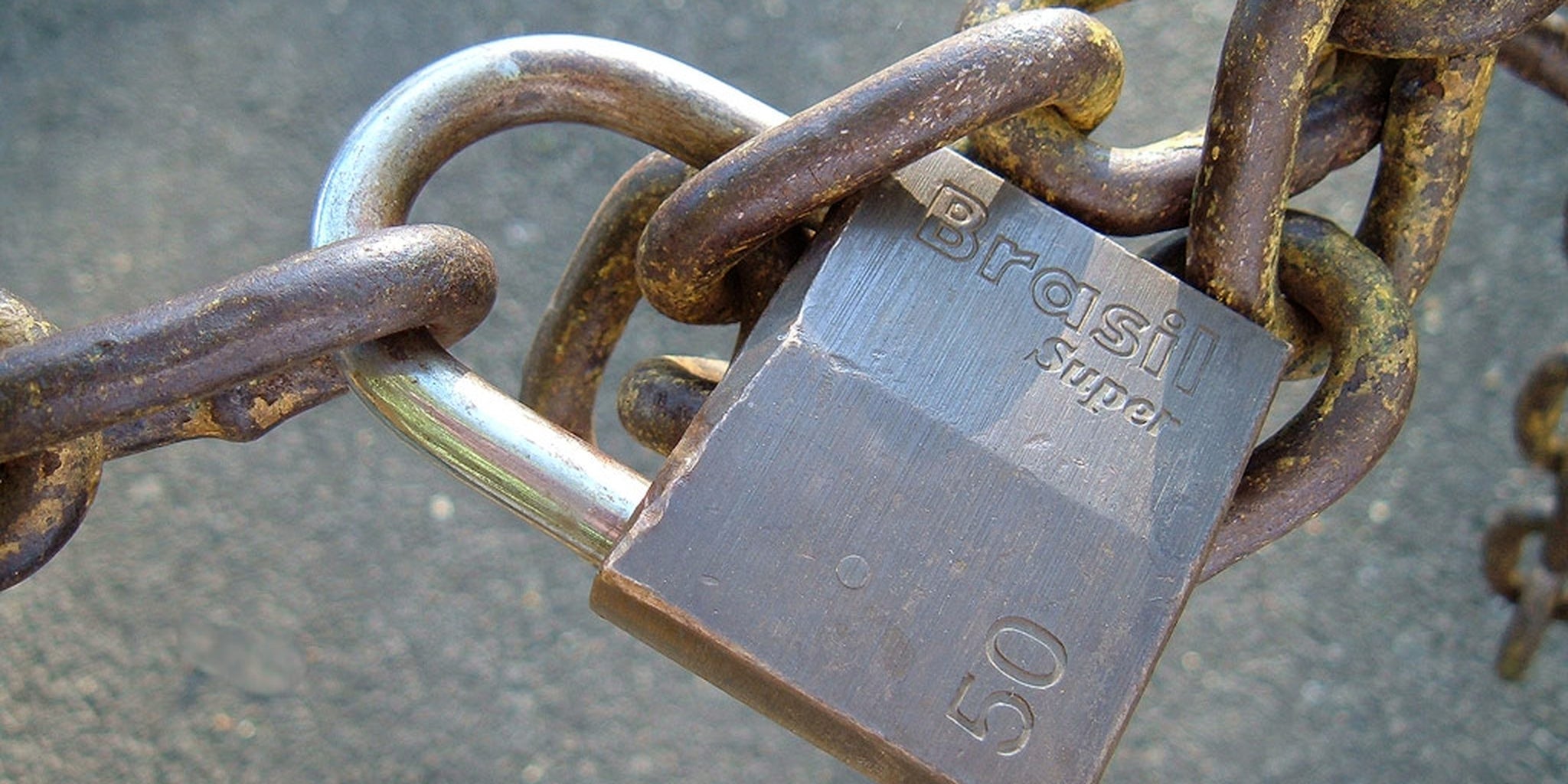 Someone padlocked this guy's ear gauge while he wasn't looking