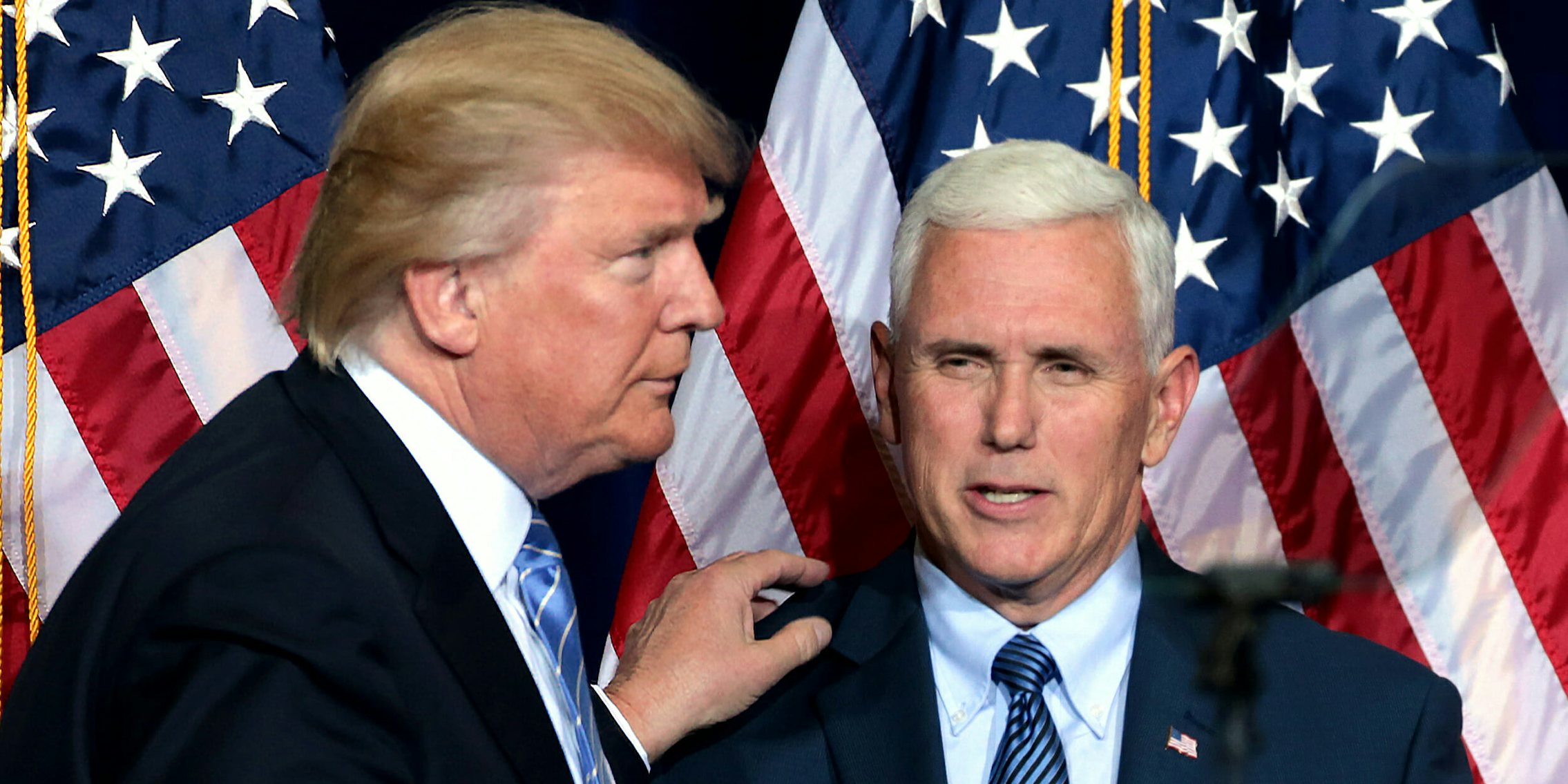 Donald Trump puts his hand on Mike Pence's shoulder