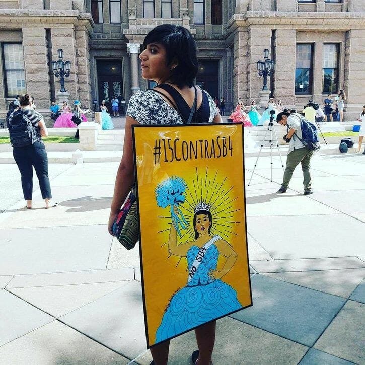 A resistance art illustration of anti-Sanctuary City resistance by Yocelyn Riojas, being worn by Riojas.
