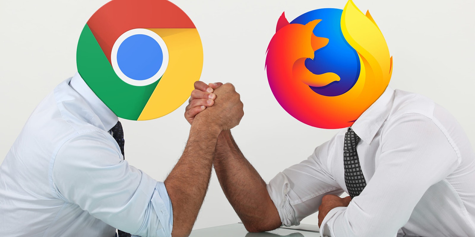 man in suit with Chrome logo head and man in suit with Mozilla logo head arm-wrestling