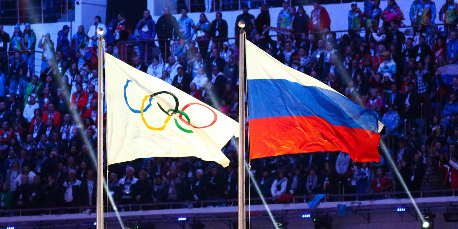 russia flag next to olympic flag
