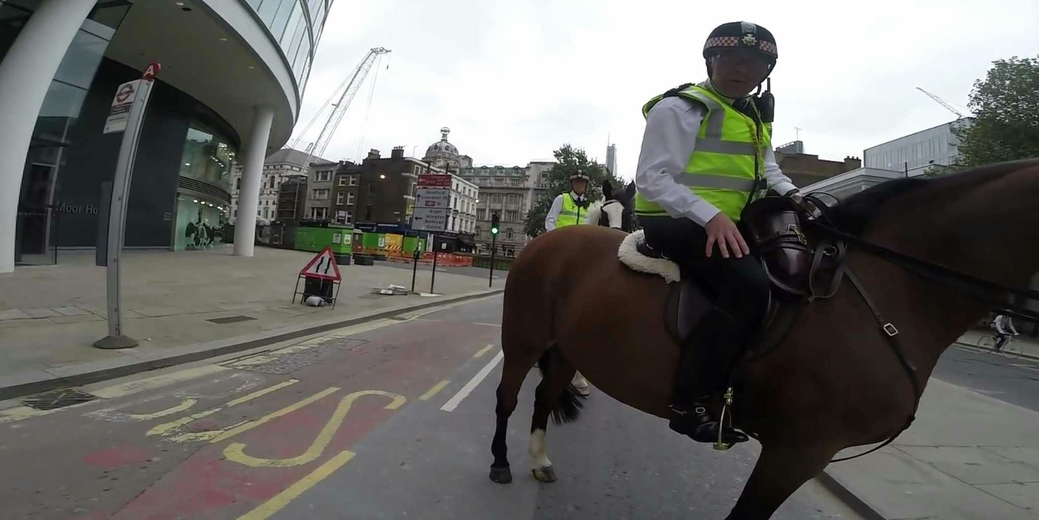 Reckless biker learns why you don't mess with a cop on a horse