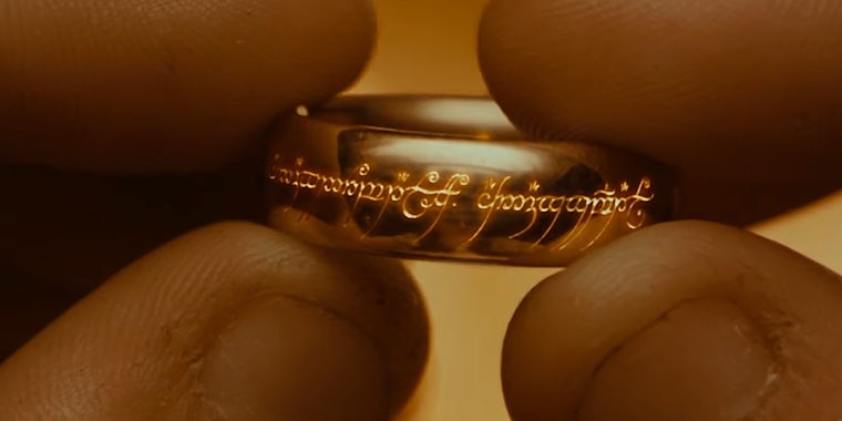 Frodo holding the One Ring