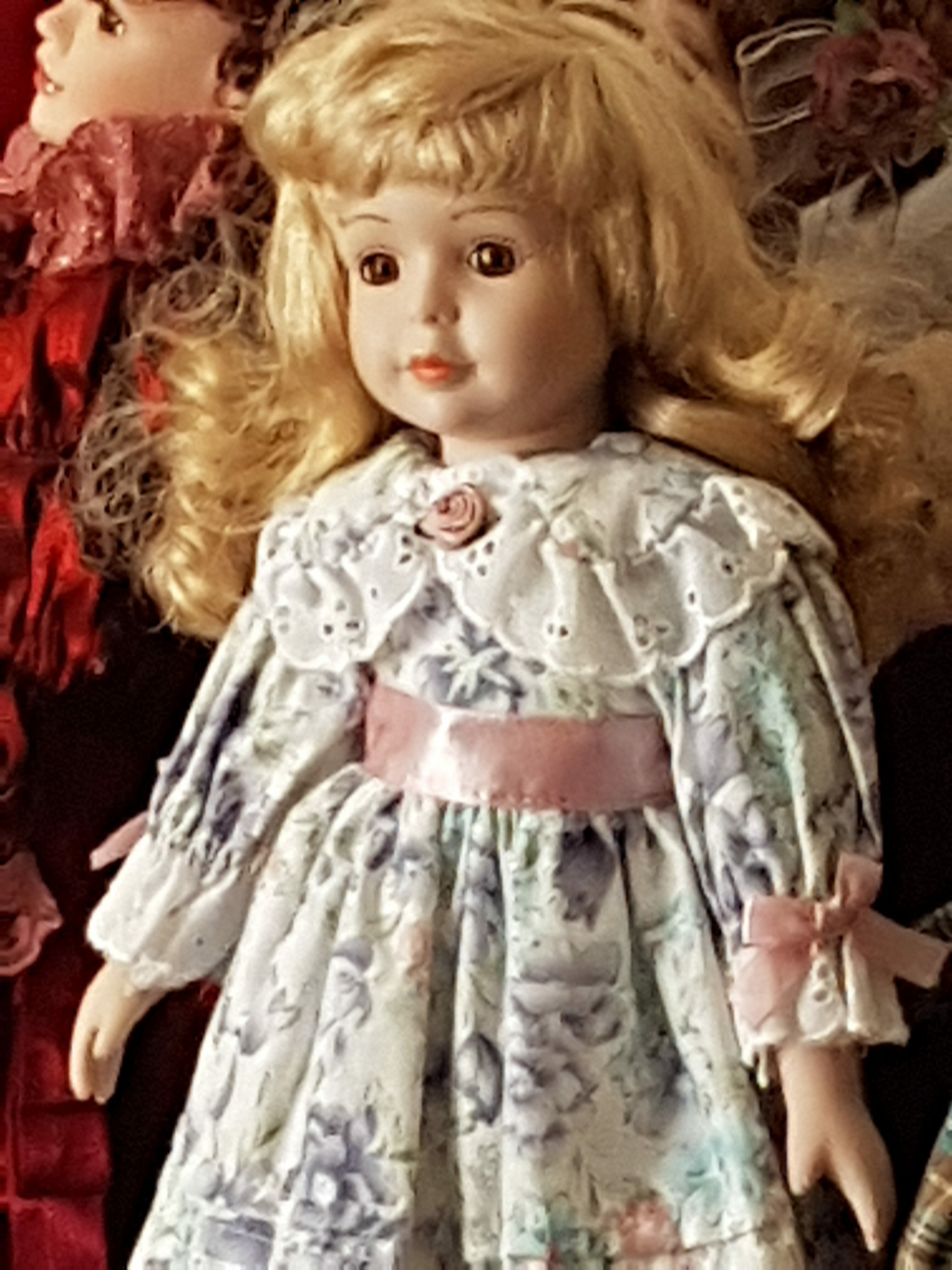 Woman Claims Her 'Haunted' Doll Collection is Scaring Off Her Neighbors