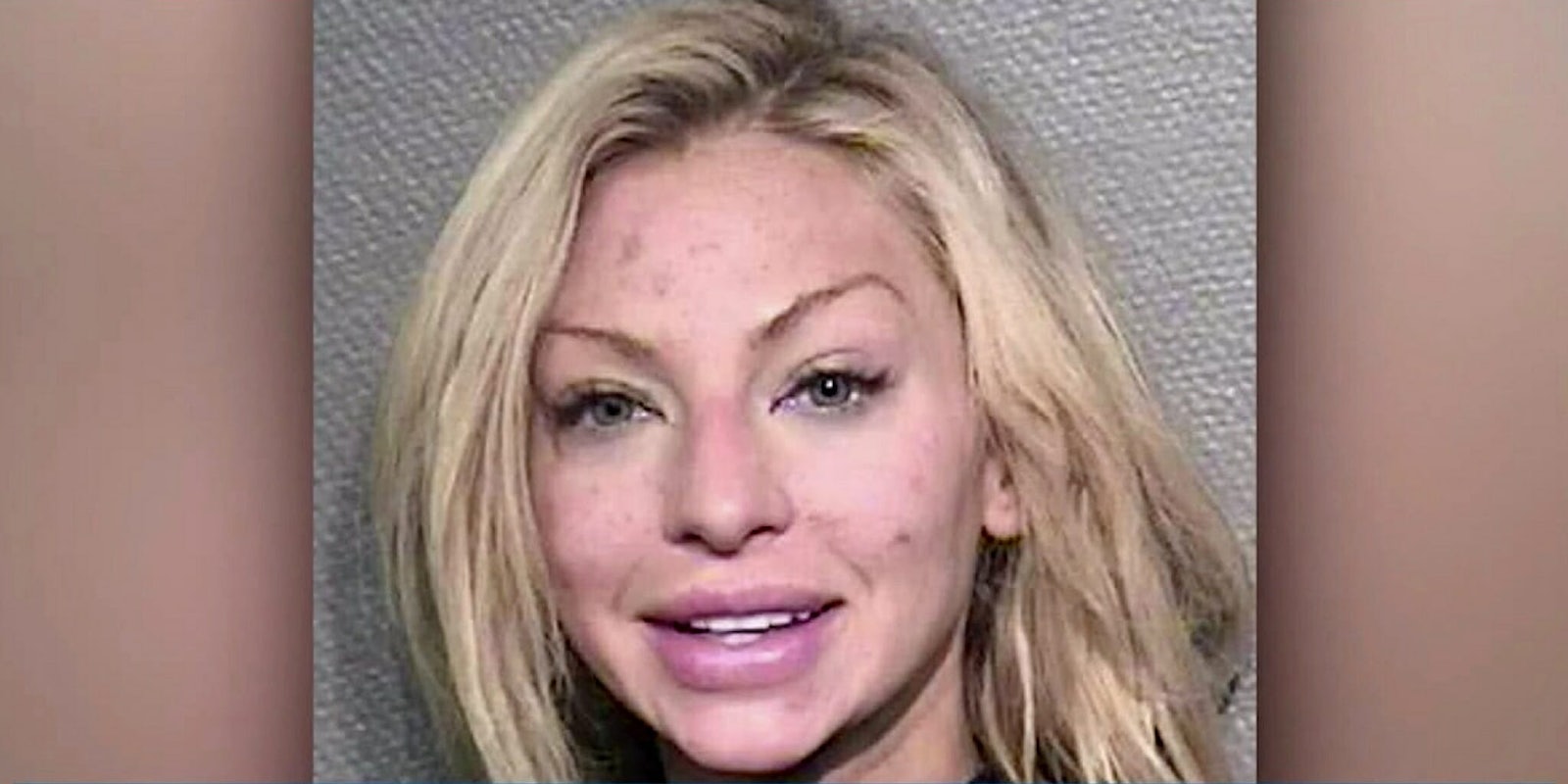 Lindy Lou Layman's booking photo after being arrested for causing damage to a date's home