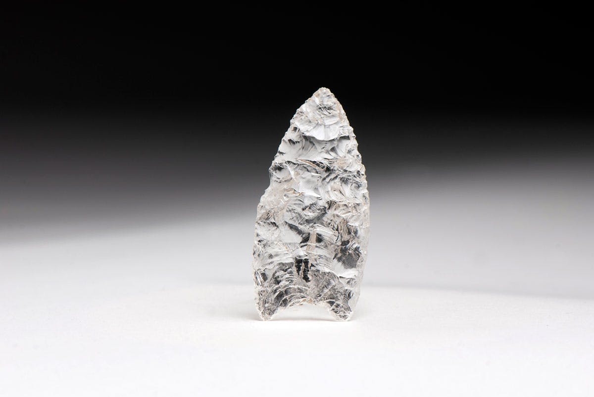 Ancient clovis people crystal point tool. 