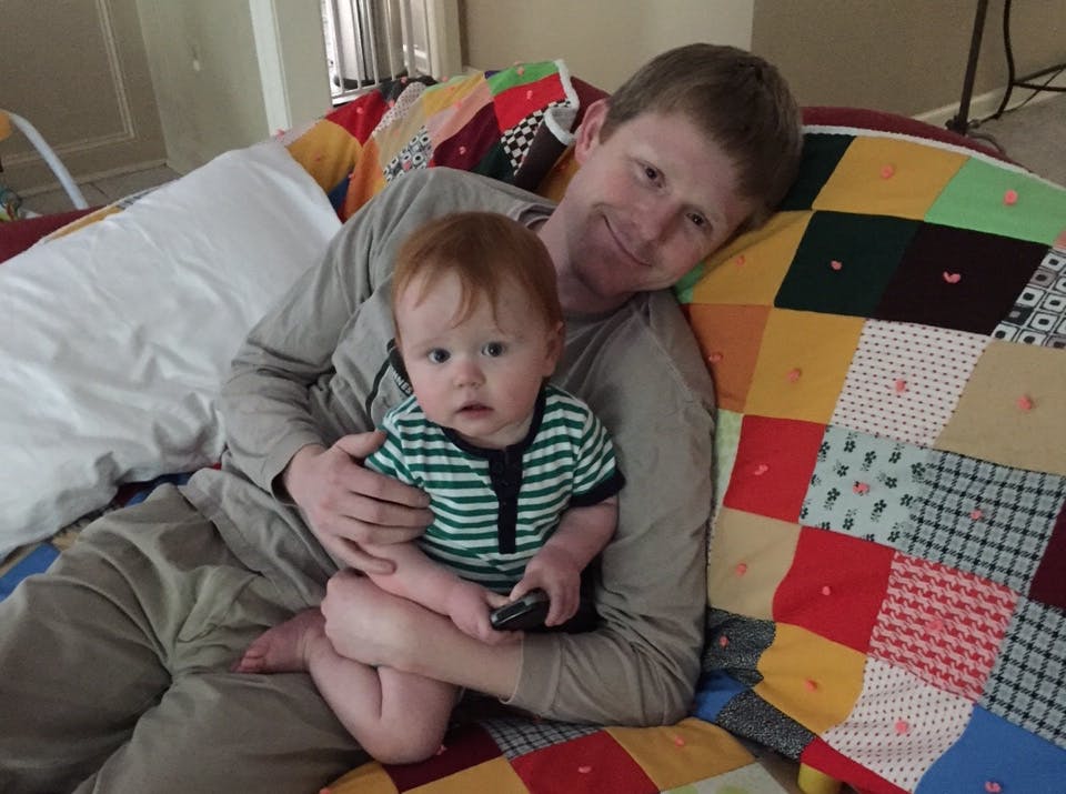 Troy Goode, 30, with his 15-month-old son—Ryan. 