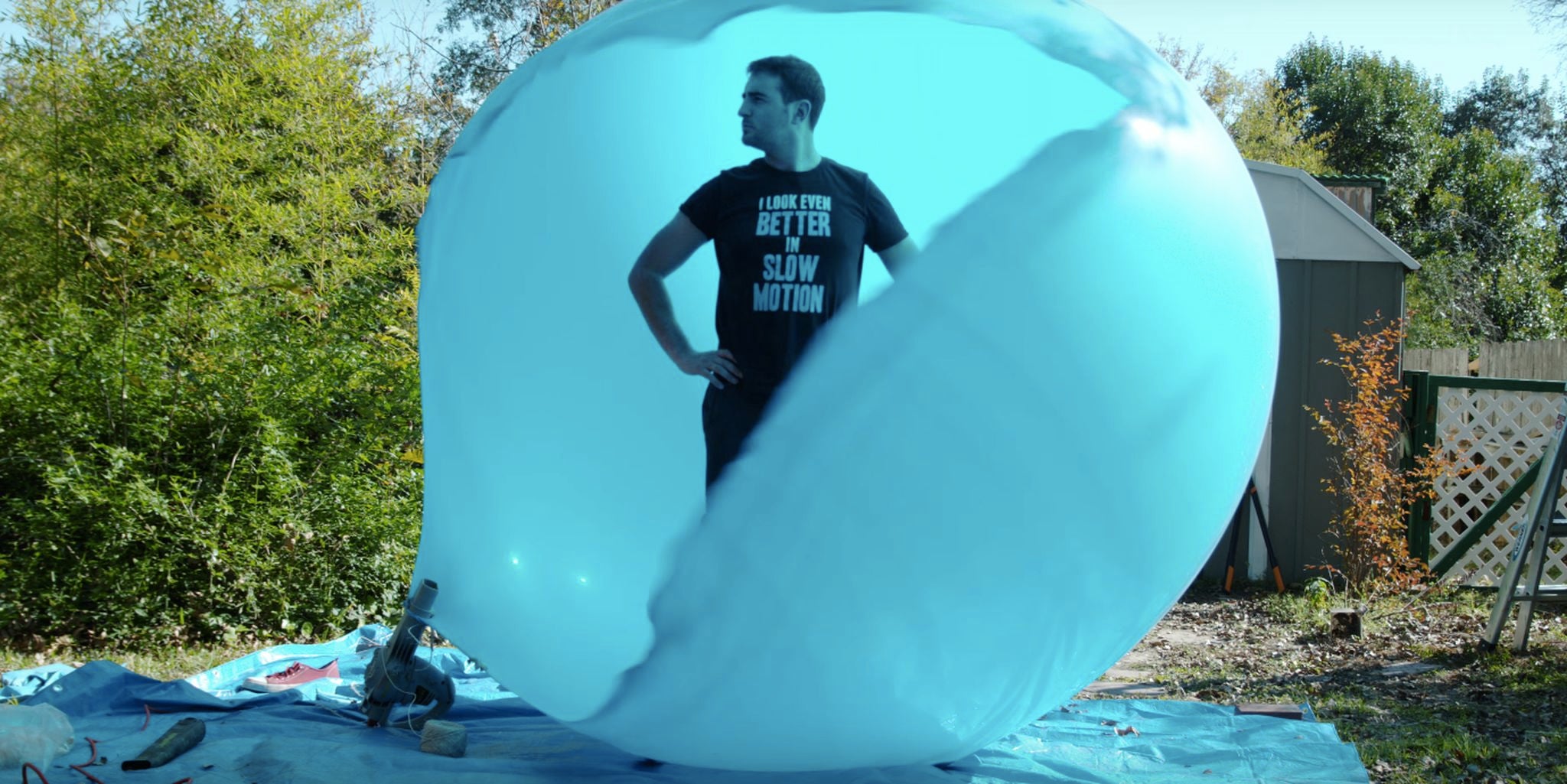 Man inflates and gets inside giant balloon to pop it in slomo The Daily Dot