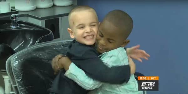 Reddy and Jax hug after Jax got the same haircut as Reddy to trick their teacher.