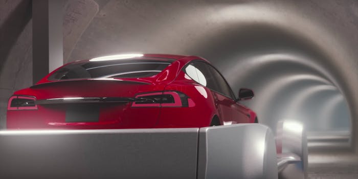 elon musk's boring company tunnel : tesla-like car on a skate in a tunnel under LA