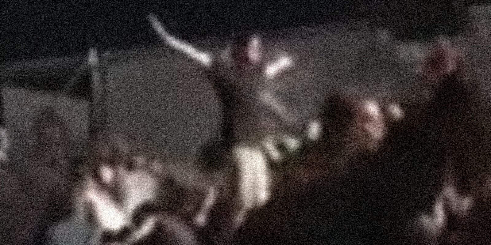 Man standing in crowd taunting the Las Vegas shooter
