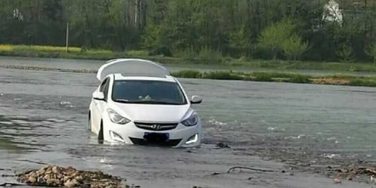 chinese man drives car in river thanks to gps