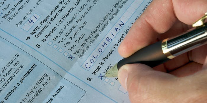 Man filling out US Census form