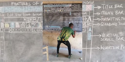 Man teaching MS Word on a chalkboard