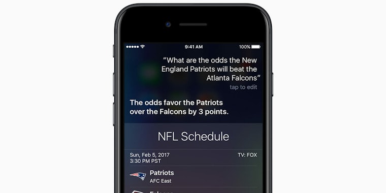iPhone with Hey Siri and NFL stats onscreen
