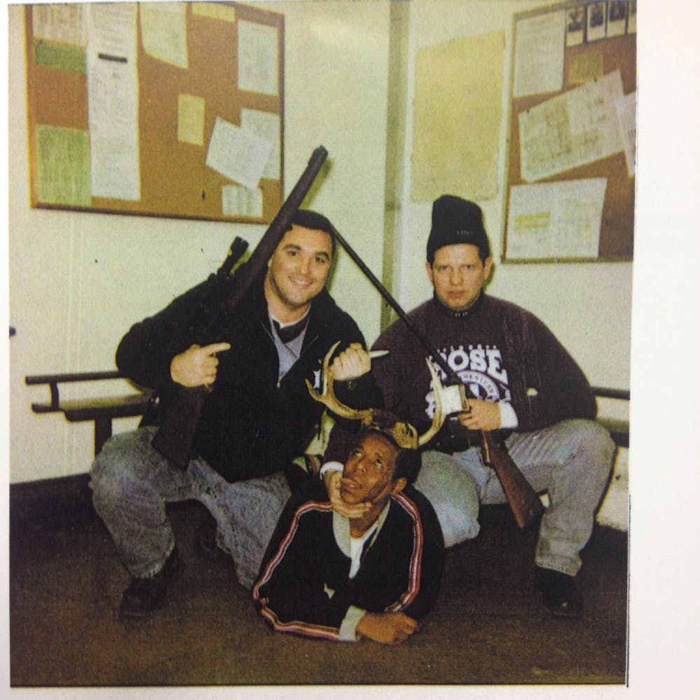 Chicago Police Officers Jerome Finnigan, left, and Timothy McDermott, right, with an unidentified man —
