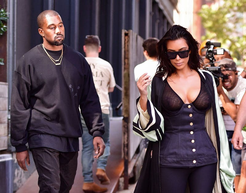 Kim Kardashian 'frees the nipple' in beachside pictures while offering life  tip