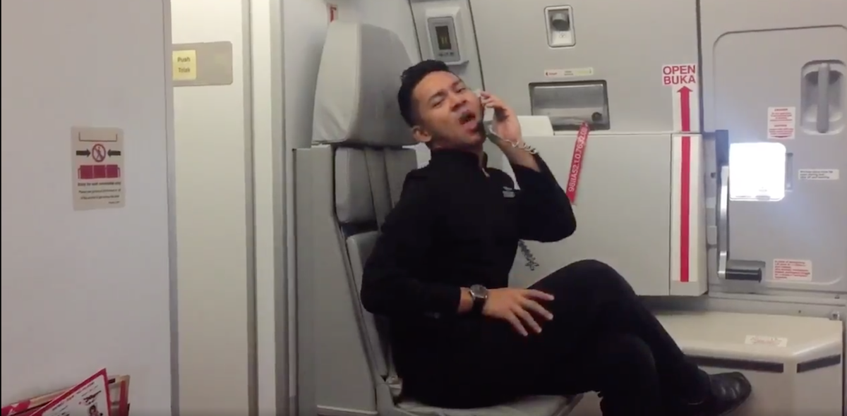 flight attendant does Britney Spears Toxic dance