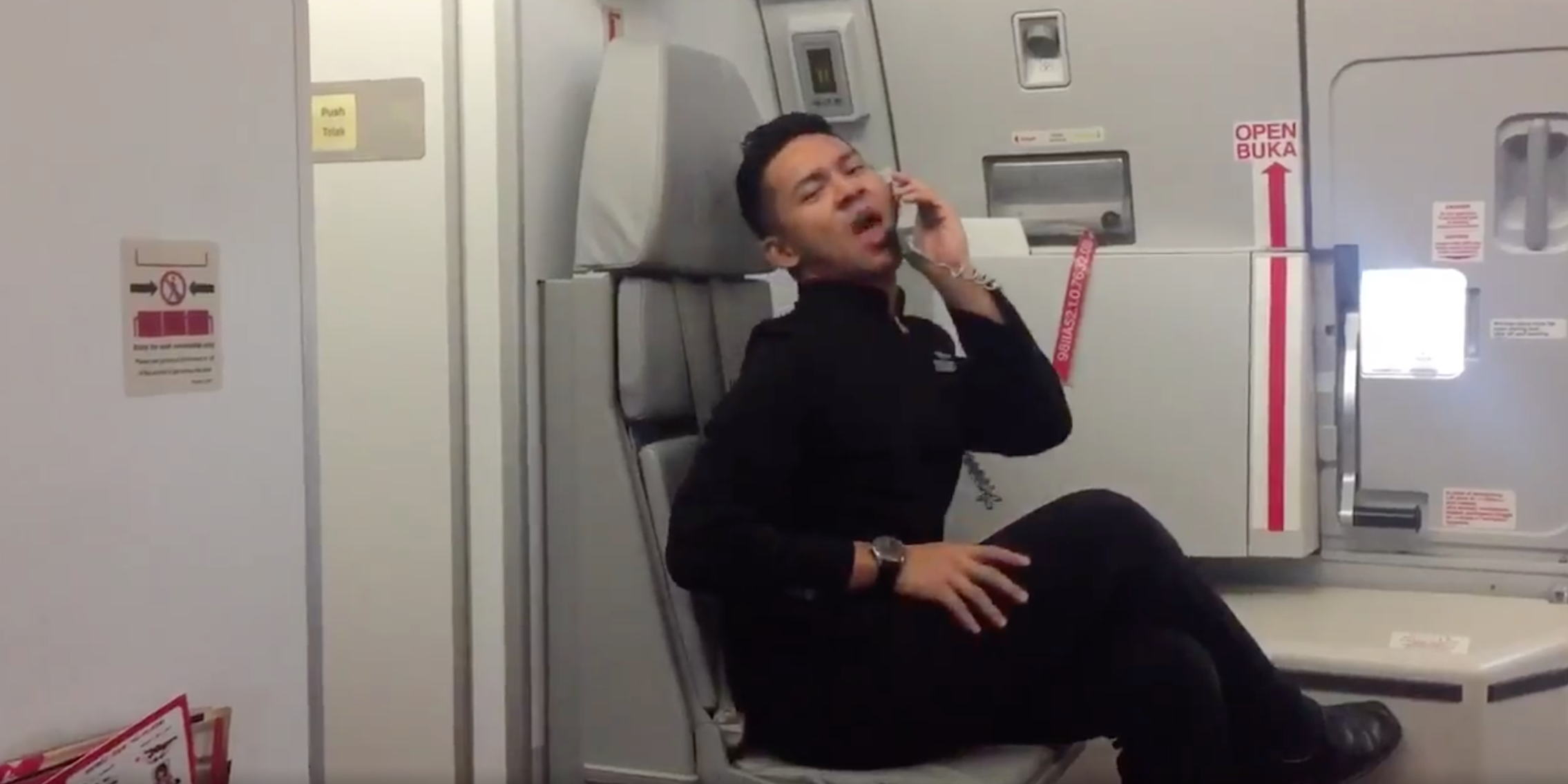 flight attendant does Britney Spears Toxic dance
