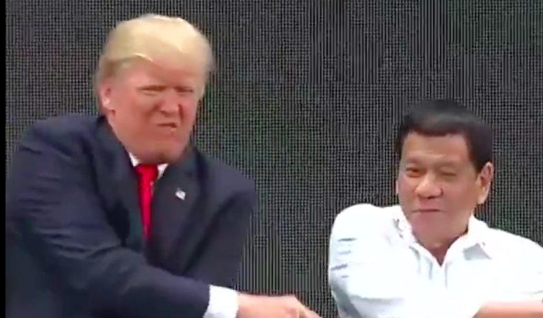 donadl trump handshake asean