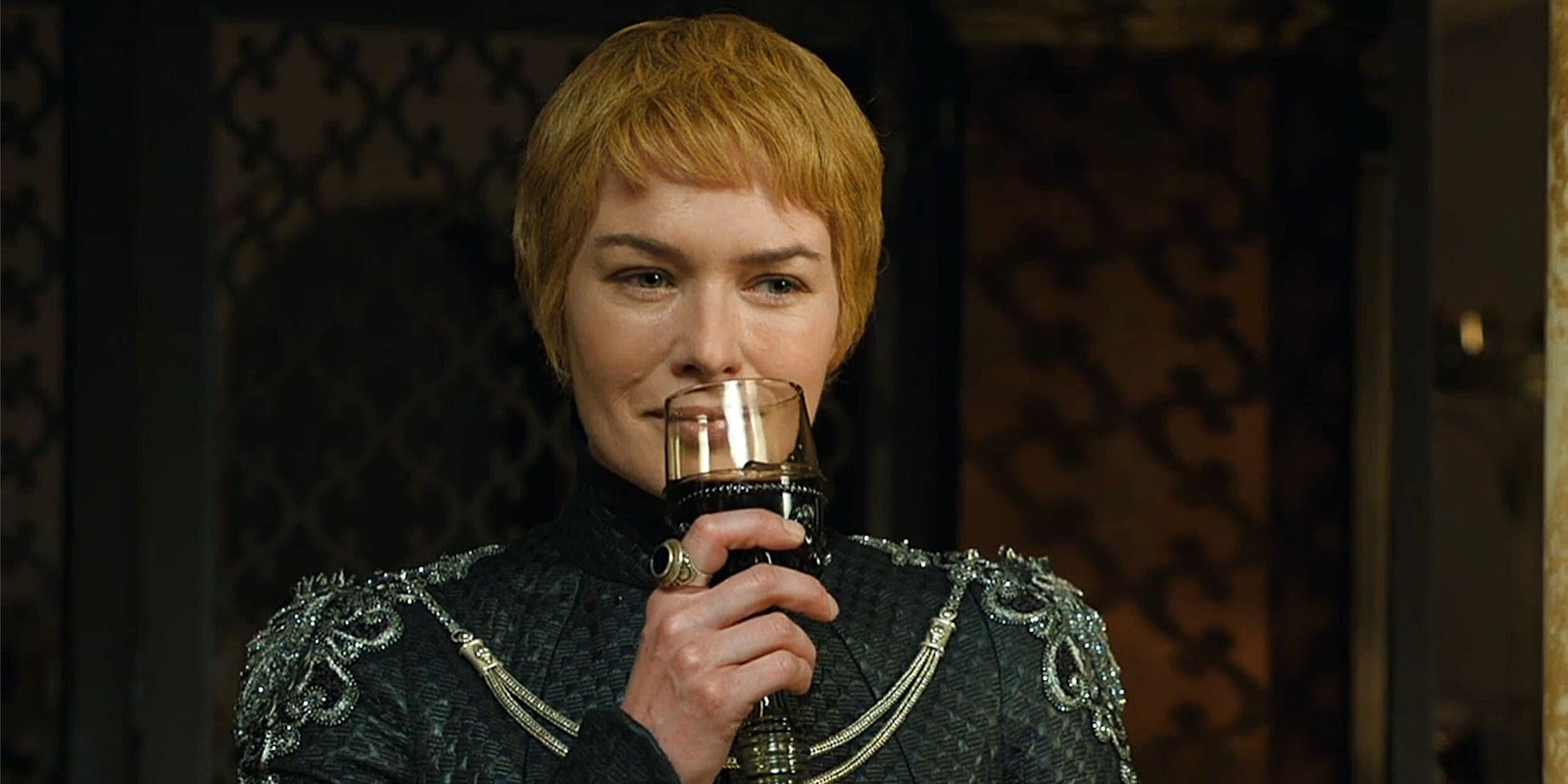 Cersei Lannister sipping wine while watching the Sept of Baelor burn