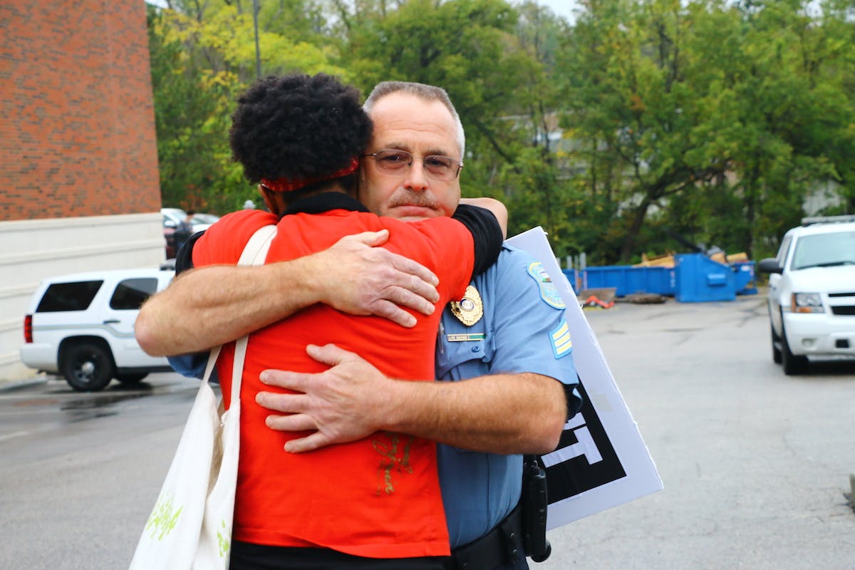 Ferguson October protester hugs police officer