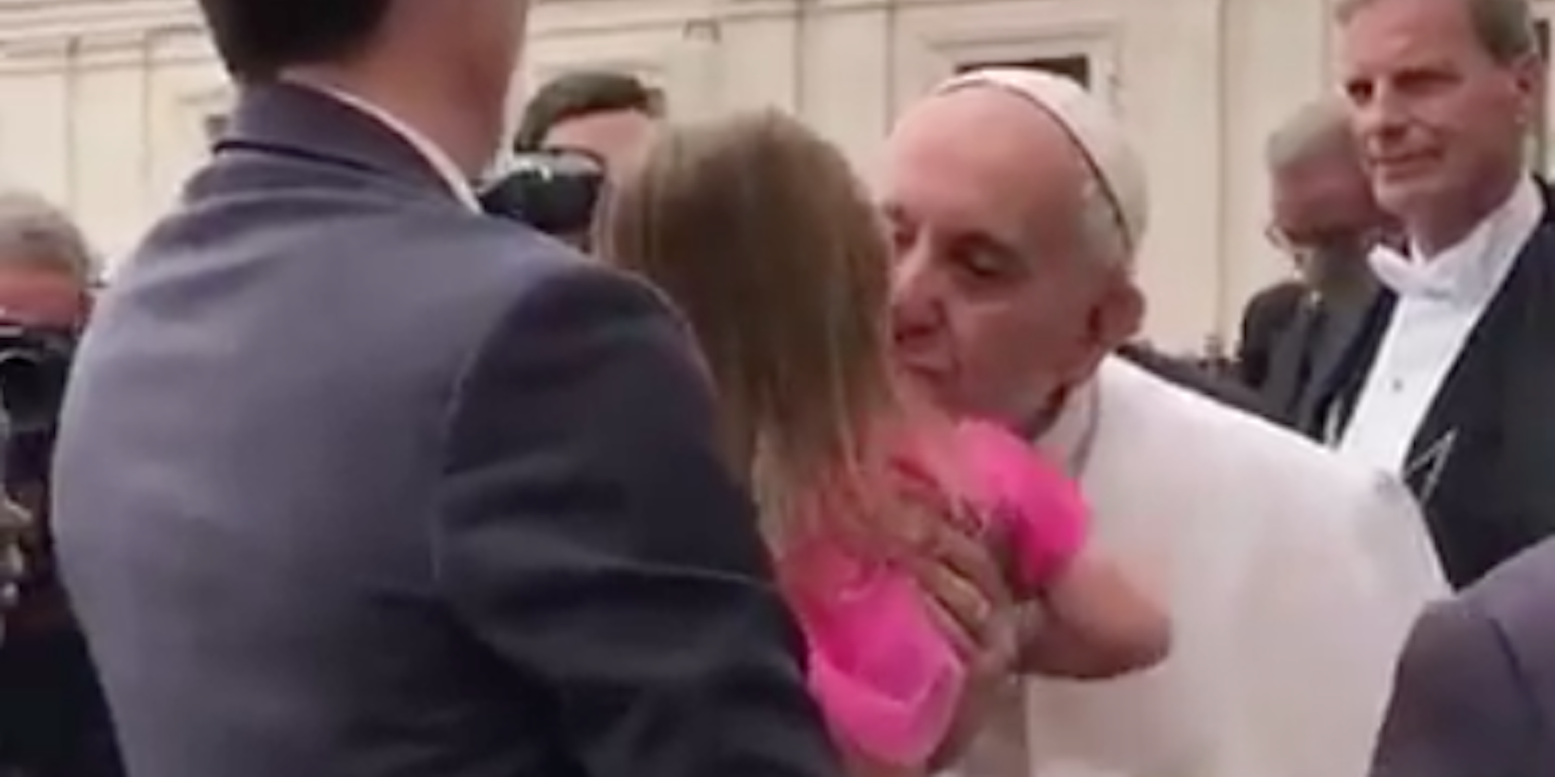 Little girl steals Pope hat