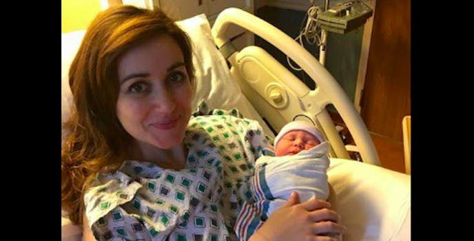 woman in labor delivers baby