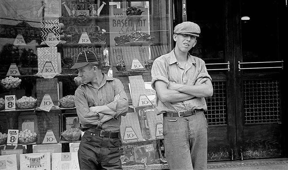 Young men standing outside a dime store