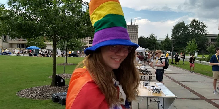 Lyn from Pride Alliance with rainbow hat