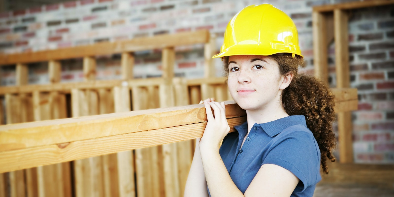 woman construction worker, trade blue collar labor liberal arts degree