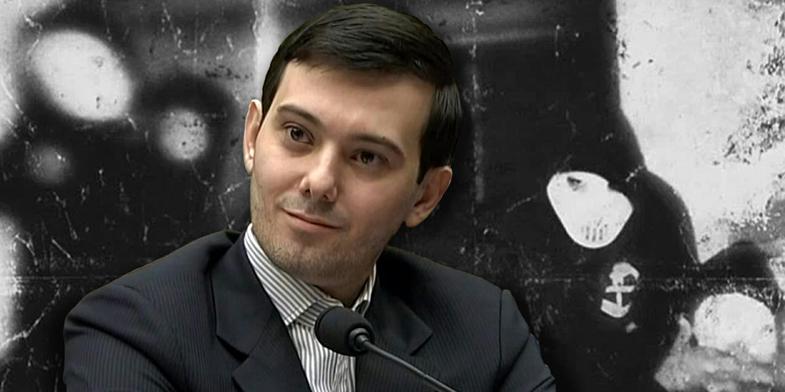 Martin Shkreli in front of "Once Upon A Time In Shaolin" cover