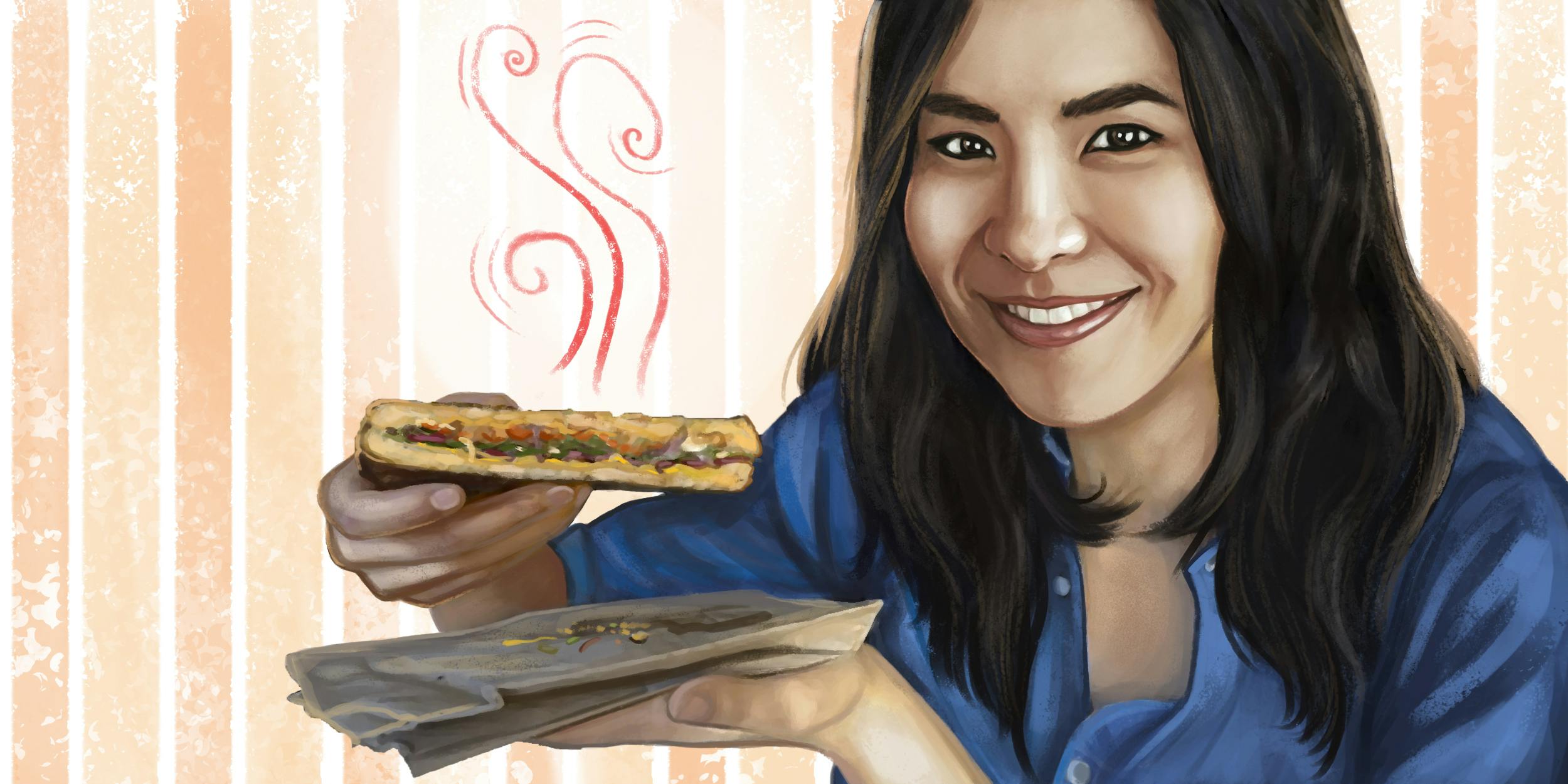 Lynn Chen holding a sandwich