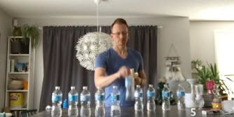 teacher flips water bottles