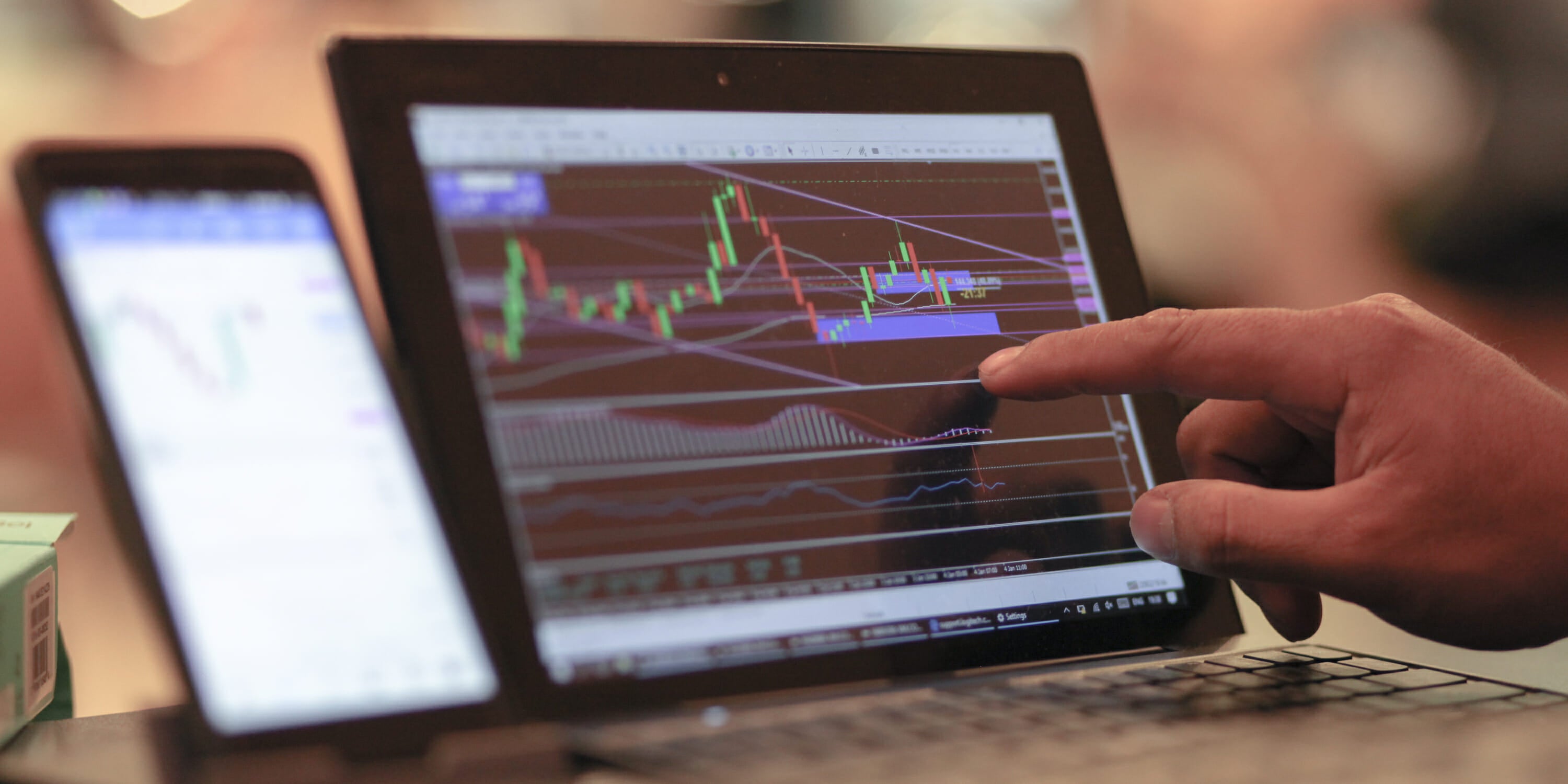 Trader on Computer with Coffee