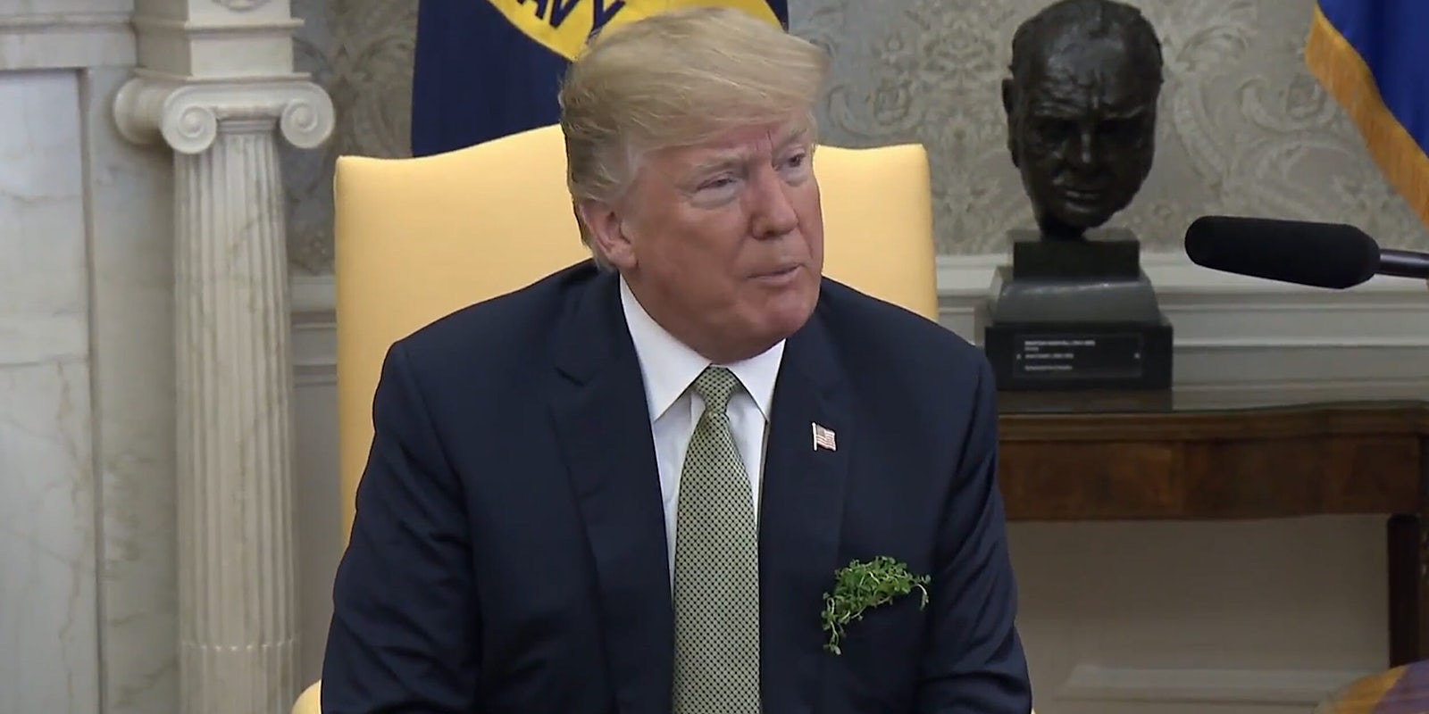 Donald Trump with clover in his jacket pocket